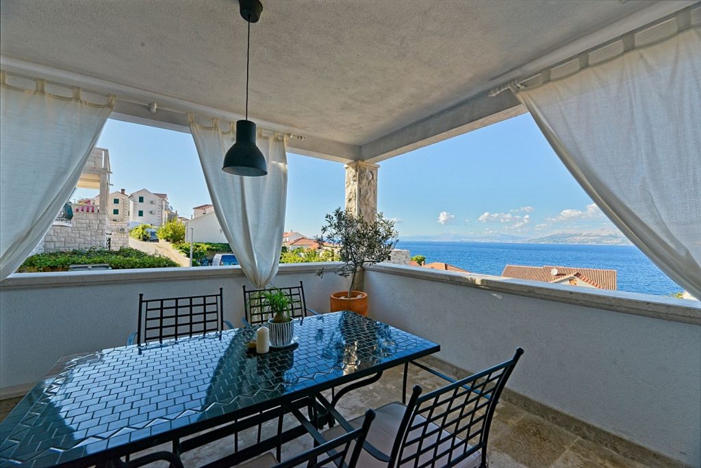 Sea view terrace in Art apartment Postira