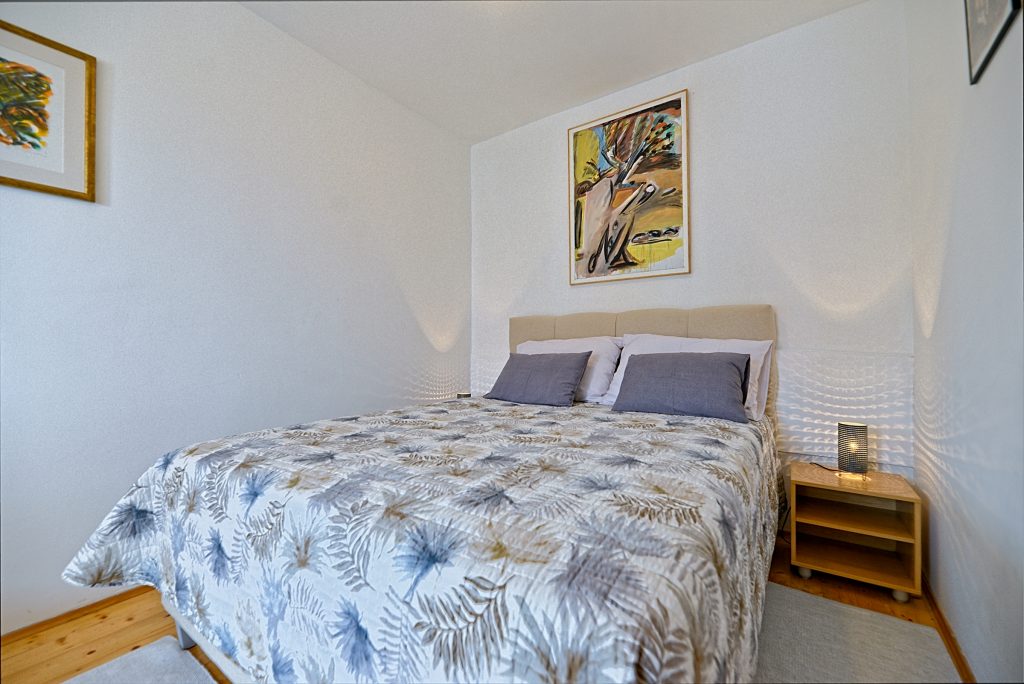 Bedroom of Happy Apartments in Postira